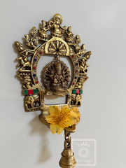 Hanging Sukhasana Laxmi with Prabhavali and Diya