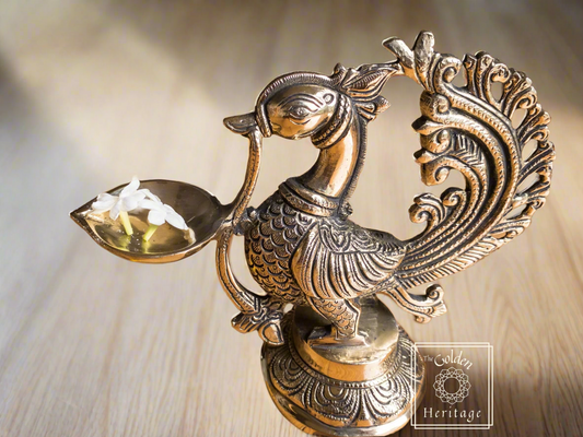Brass Peacock Oil Lamp, Peacock Carved Diya - The Golden Heritage #