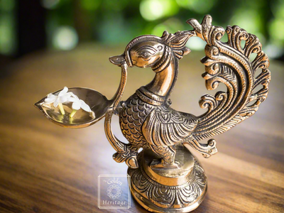 Brass Peacock Oil Lamp, Peacock Carved Diya - The Golden Heritage #