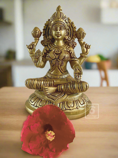 Brass Goddess Lakshmi sitting on a lotus flower - The Golden Heritage #